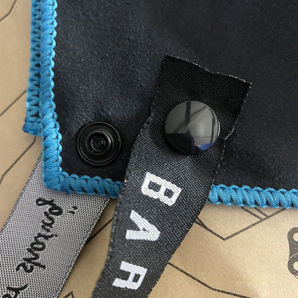 trail towel - close up of button loop